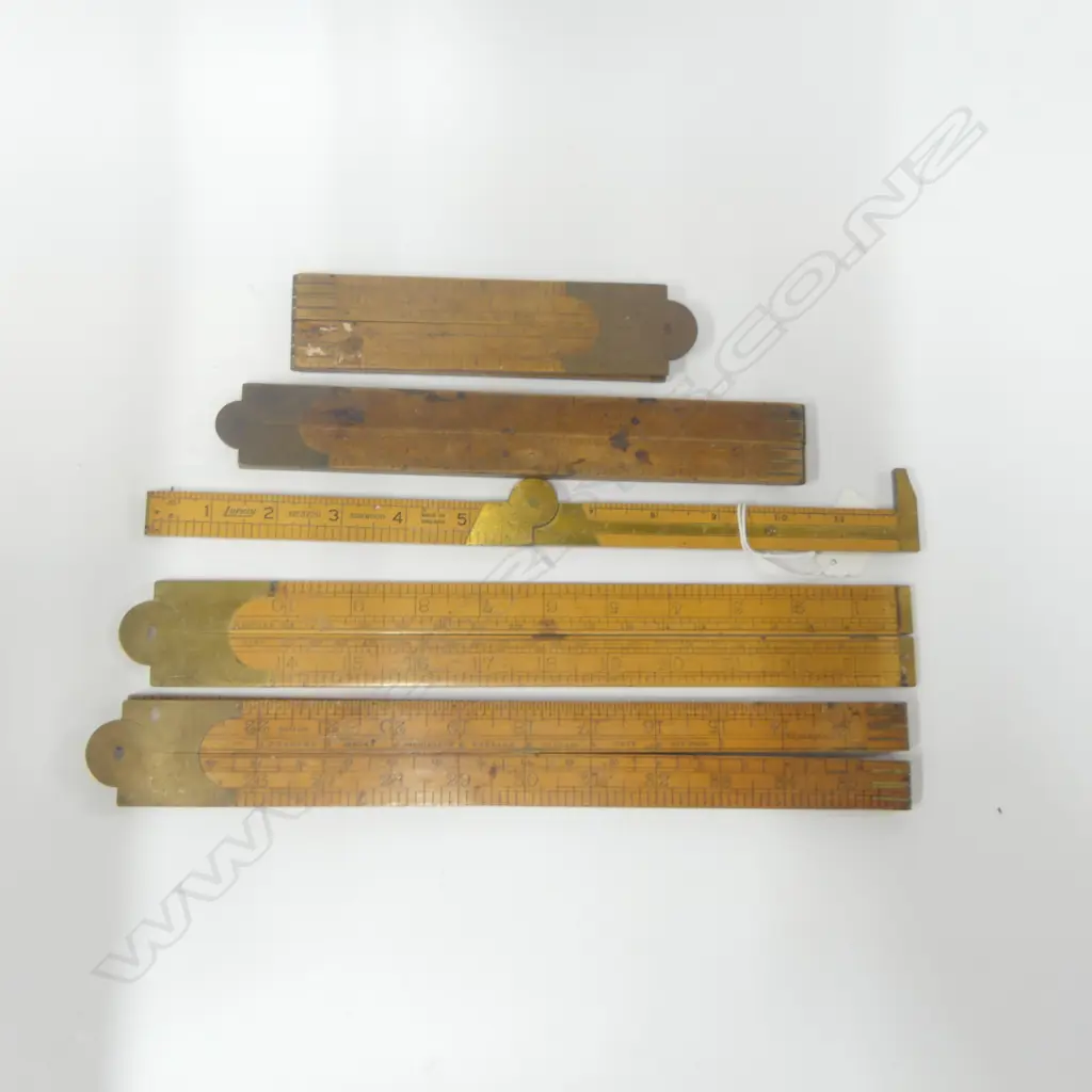 Four folding boxwood rules; a Lufkin No. 372R 12" rule and a rope & hawser gauge. (6) Image 1++