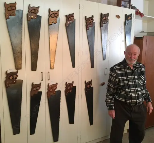 10 various panel saws. Note: the 2nd photo shows an example of how Nolan displayed his saws. The saws in this 2nd photo are not necessarily in this lot. Image 1++