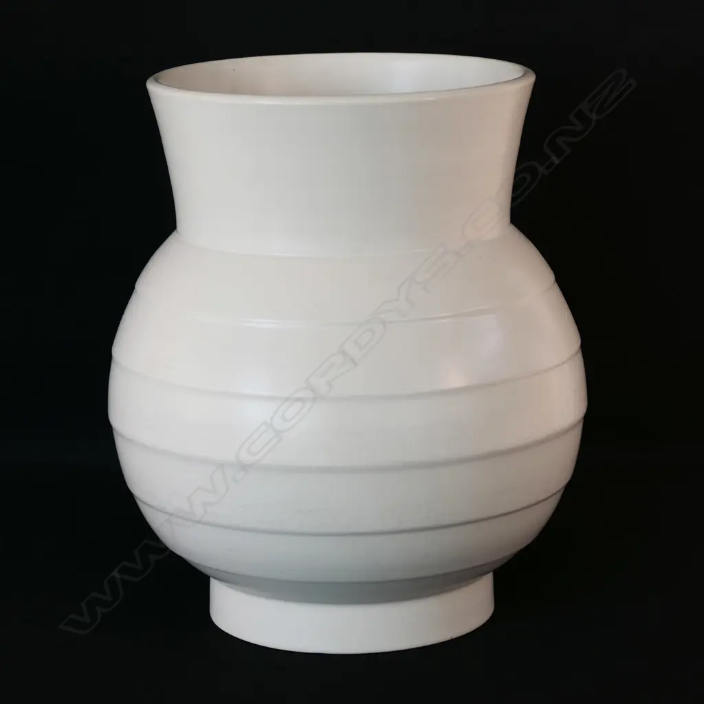 A medium hand potted Crown Lynn vase. Lathed decoration. printed Tiki mark to base Image 1++