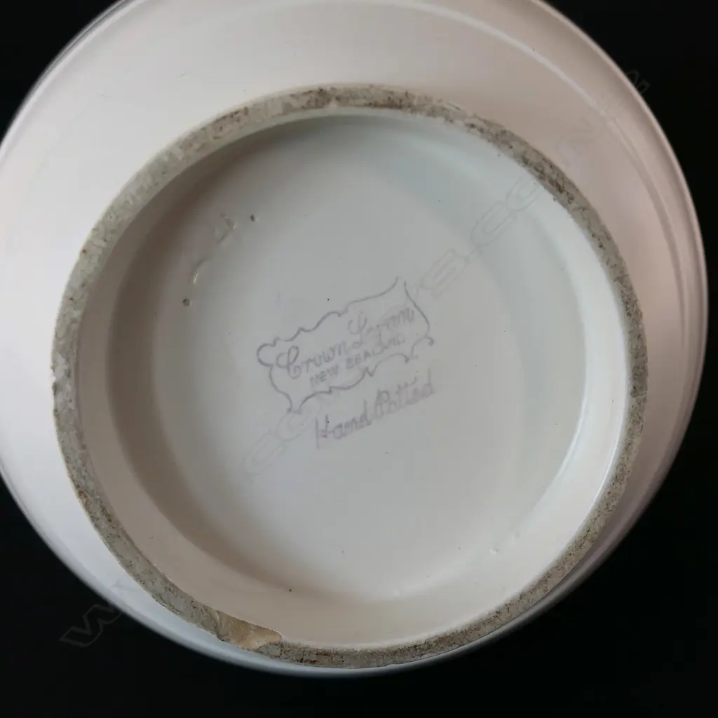 A medium hand potted Crown Lynn vase. Lathed decoration. printed Tiki mark to base Image 1++