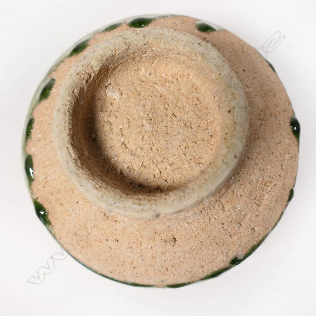 Mirek Smisek green glazed porcelain bowl cut sided decoration. Dia.130mm. Image 1++