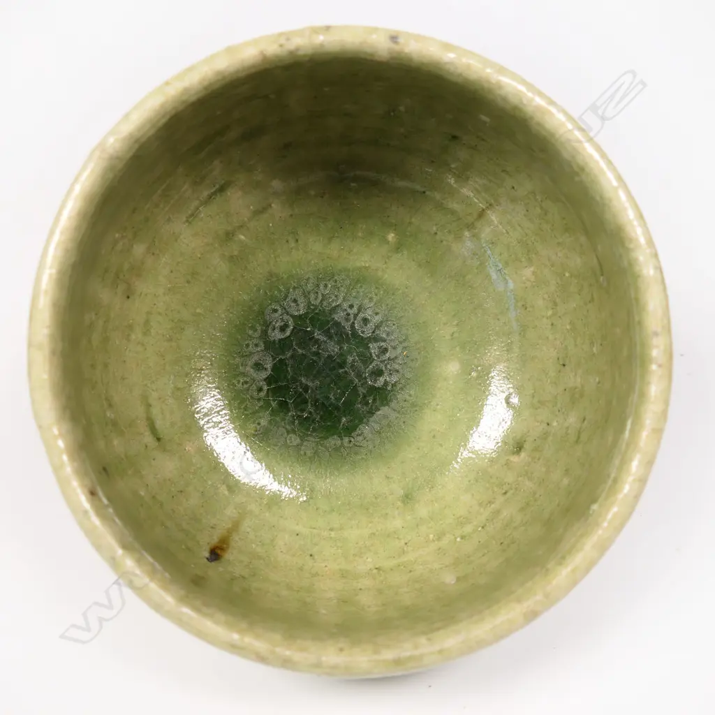 Mirek Smisek green glazed porcelain bowl cut sided decoration. Dia.130mm. Image 1++