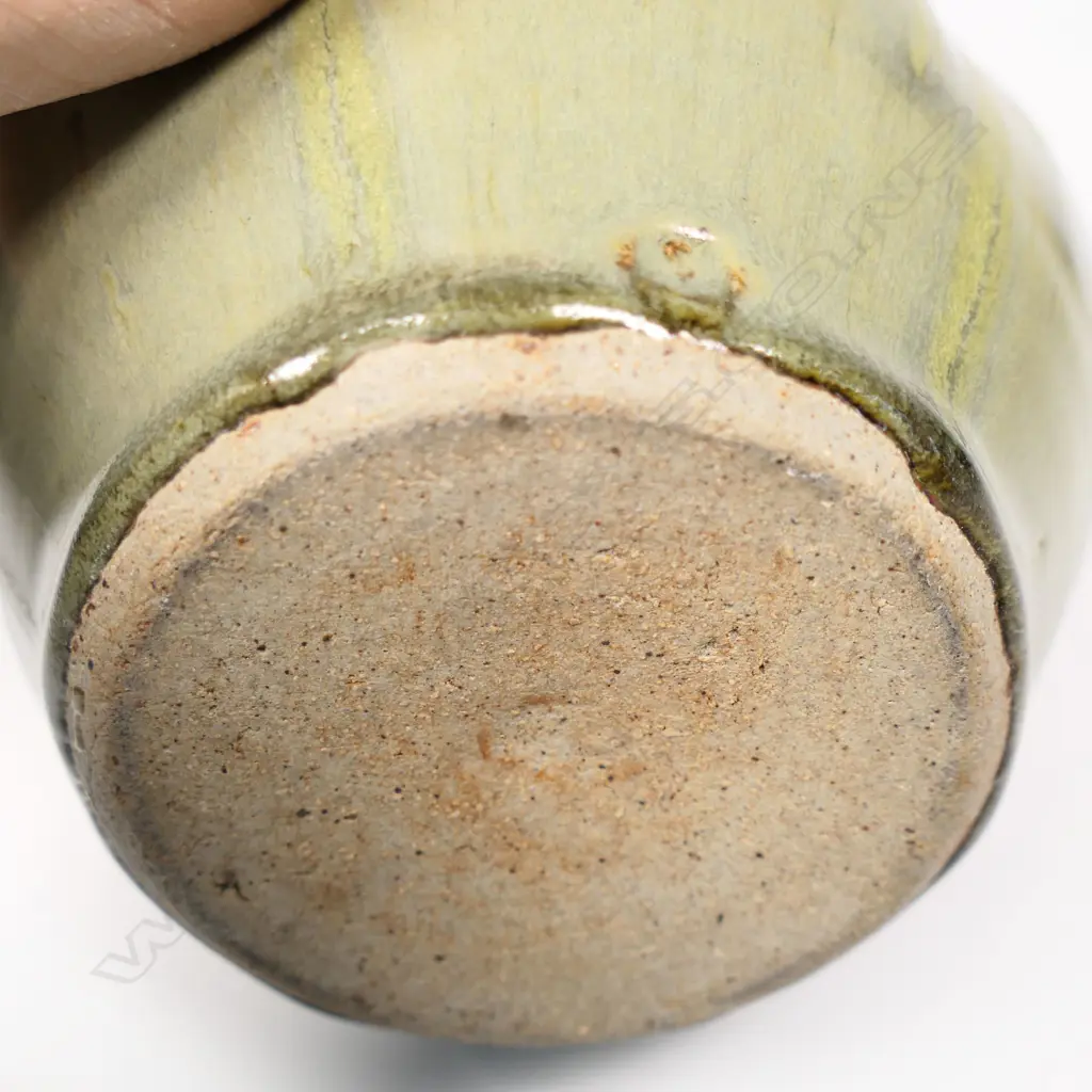 Mirek Smisek 1960's/70's Lobe Sided Vase. Pale green ash glaze. Impressed potter's mark. H.180mm. Image 1++