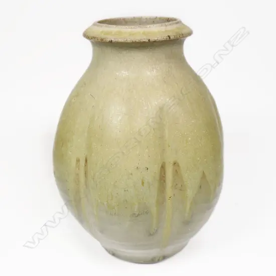 Mirek Smisek 1960's/70's Lobe Sided Vase. Pale green ash glaze. Impressed potter's mark. H.180mm.