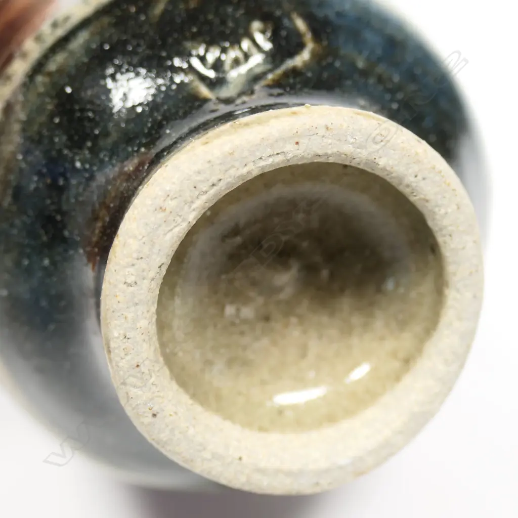 Mirek Smisek unomi rib sided rust red and blue glaze. Impressed potter's mark. H,95mm. Image 1++