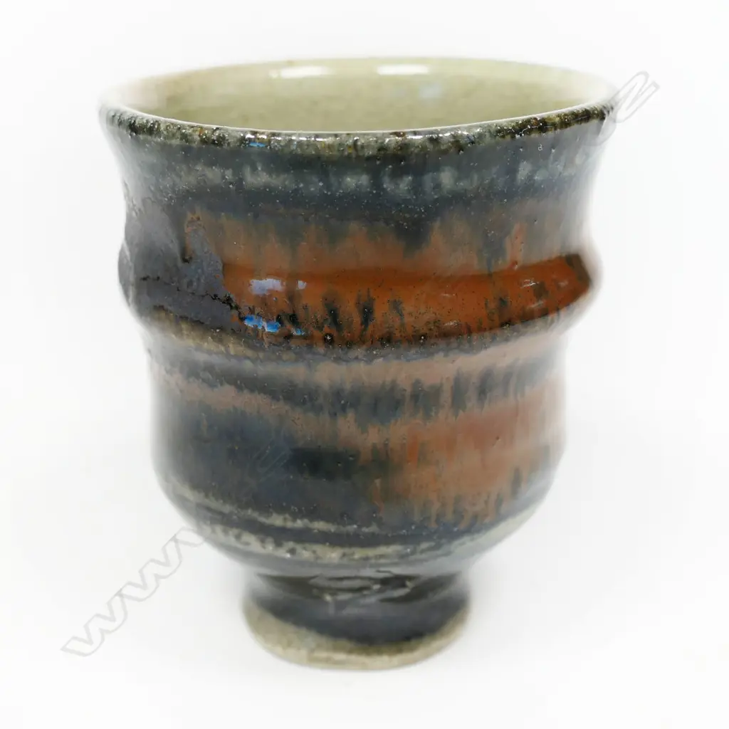 Mirek Smisek unomi rib sided rust red and blue glaze. Impressed potter's mark. H,95mm. Image 1++