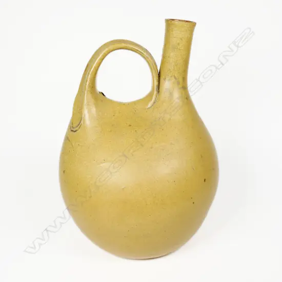 Len Castle Ceremonial Pourer Flask. Tan glaze. Small repair. H.220mm