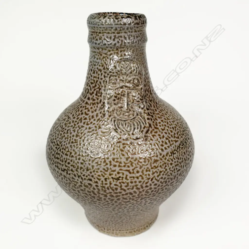 Graeme Storm Stoneware Bellarmine. Salt glazed w bearded mask panel. H.190mm. Image 1++