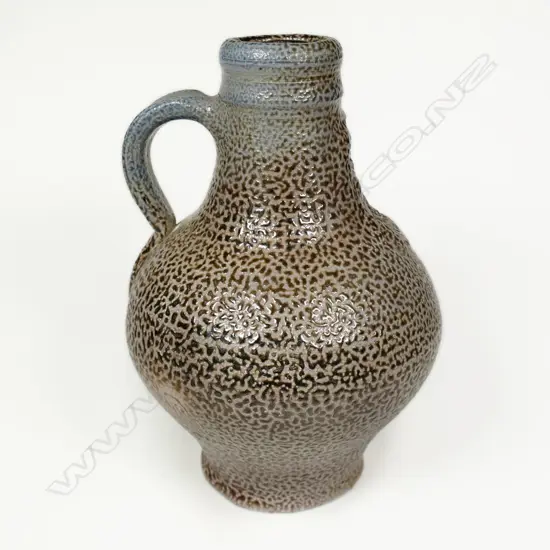 Graeme Storm Stoneware Bellarmine. Salt glazed w bearded mask panel. H.190mm.
