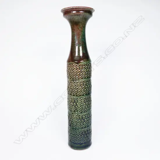 Graeme Storm Green Glazed Vase. Repeating bands of circular design. Potter's mark lower side. H.315mm (sml chip to rim)