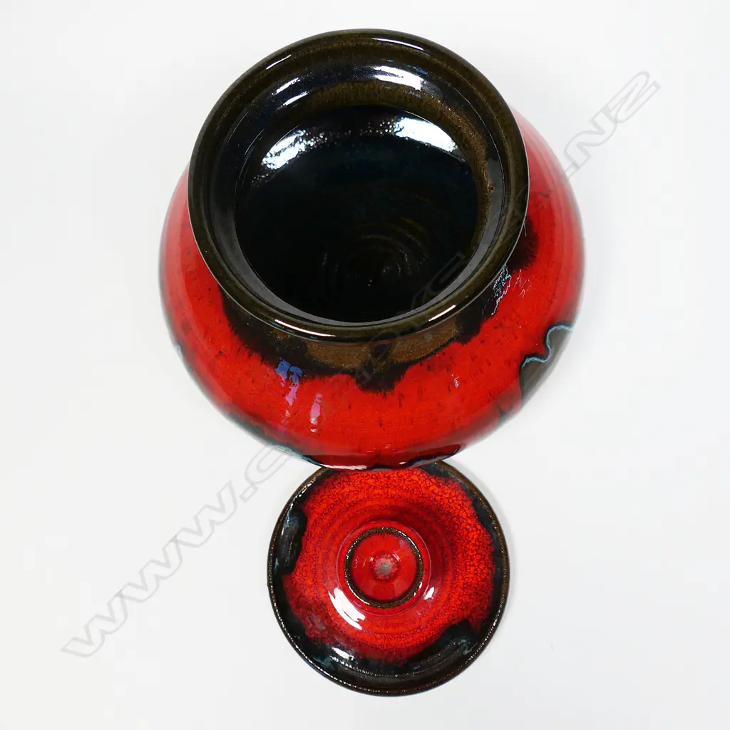 Ron Clark (Coromandel) Lidded Vessel. Distinctive rich red glaze. H.140 x 180mm Image 1++