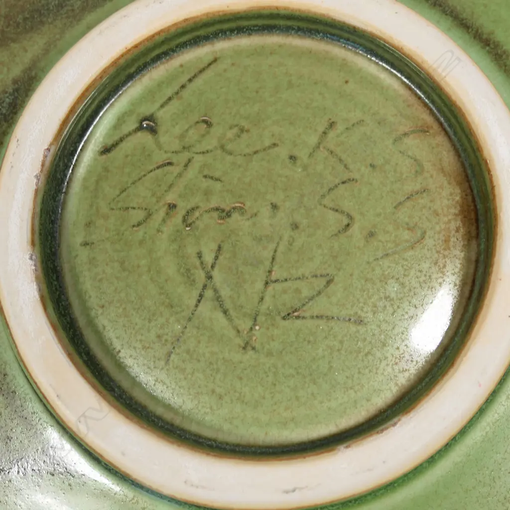 Keum Sun Lee/ Sang Sool Shim Lg Footed Platter. Pale gn glaze w incised koru detail. Dia.380mm Image 1++