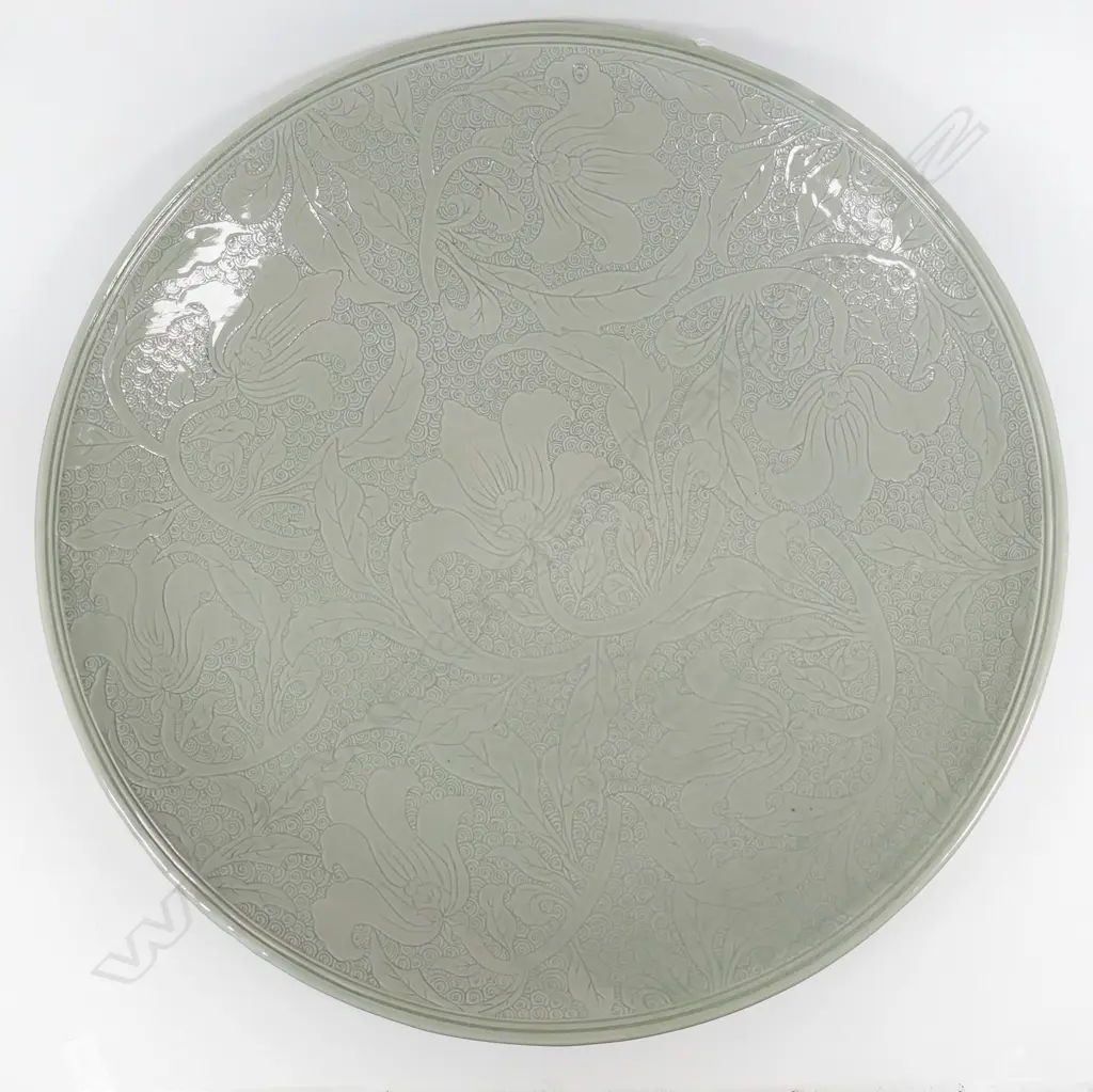 Keum Sun Lee/ Sang Sool Shim V Lg Footed Platter. Celadon ground w detailed intaglio floral design. Dia.500mm FAULTED Image 1++