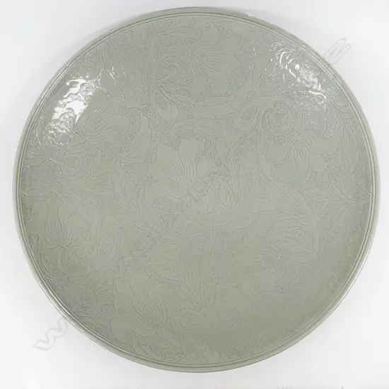 Keum Sun Lee/ Sang Sool Shim V Lg Footed Platter. Celadon ground w detailed intaglio floral design. Dia.500mm FAULTED