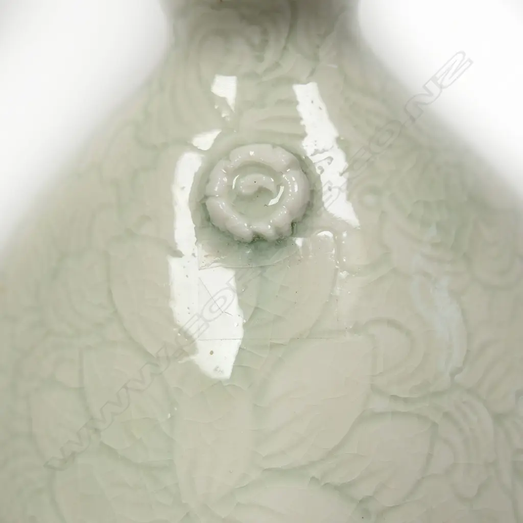 Keum Sun Lee/ Sang Sool Shim Lg Elliptical Bottle Form. Porcelain. Clear glaze over incised celadon ground. H.340mm Image 1++