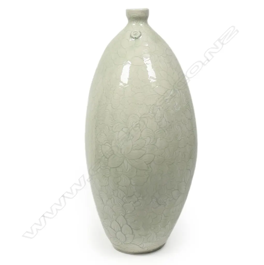 Keum Sun Lee/ Sang Sool Shim Lg Elliptical Bottle Form. Porcelain. Clear glaze over incised celadon ground. H.340mm Image 1++