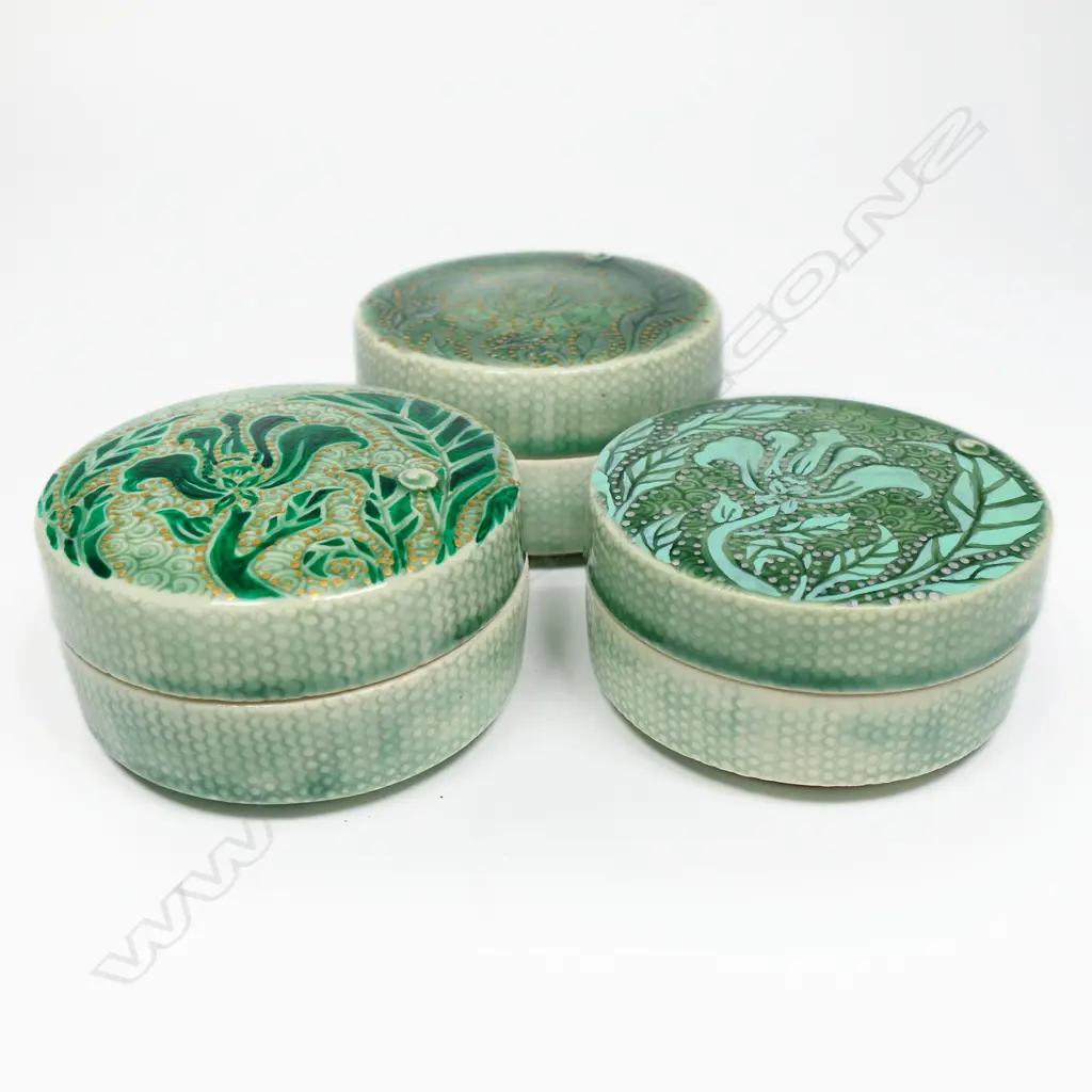 Keum Sun Lee/ Sang Sool Shim Trio Trinket Boxes. Celadon glazed porcelain floral design gold & silver detail. Dia.90mm Image 1++