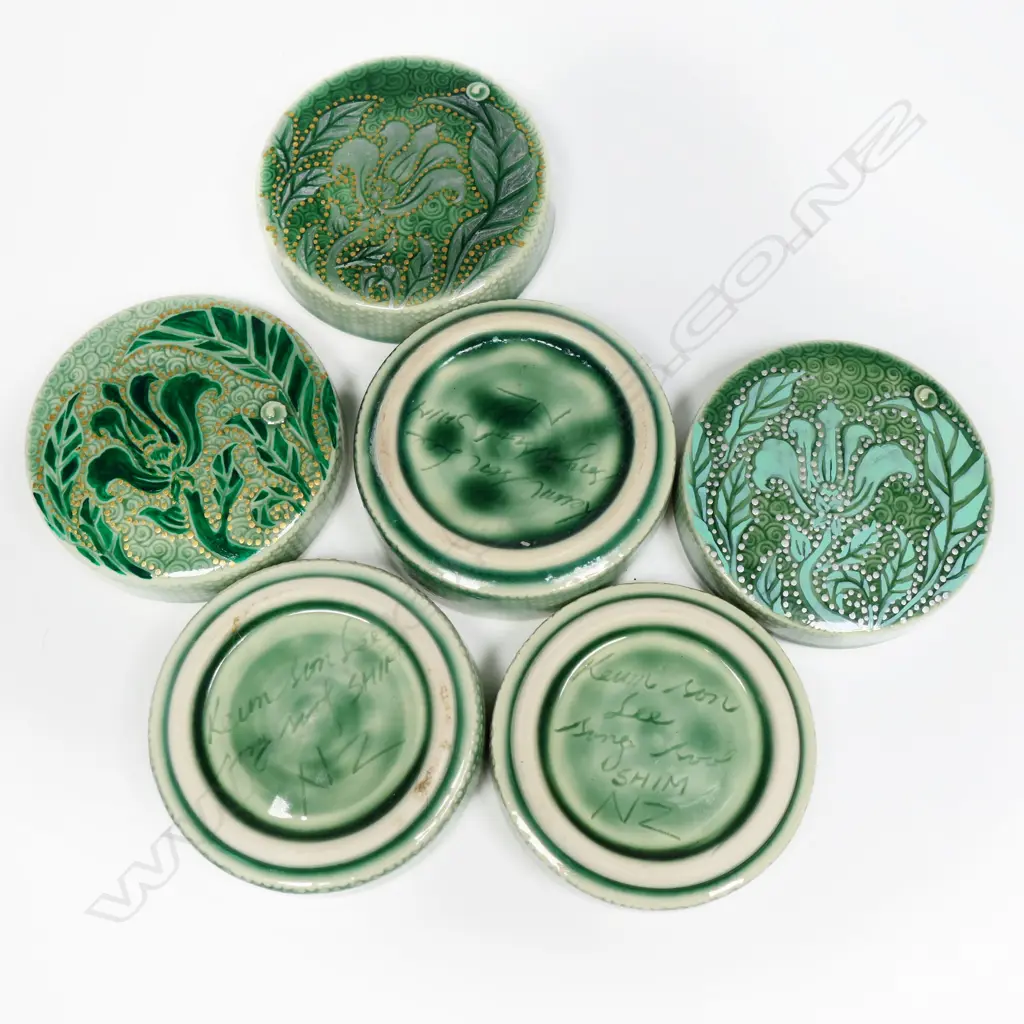 Keum Sun Lee/ Sang Sool Shim Trio Trinket Boxes. Celadon glazed porcelain floral design gold & silver detail. Dia.90mm Image 1++