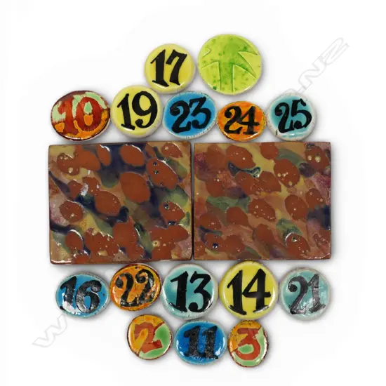 Two Warren Tippett glaze test tiles and 15 hand painted exhibition number discs,
