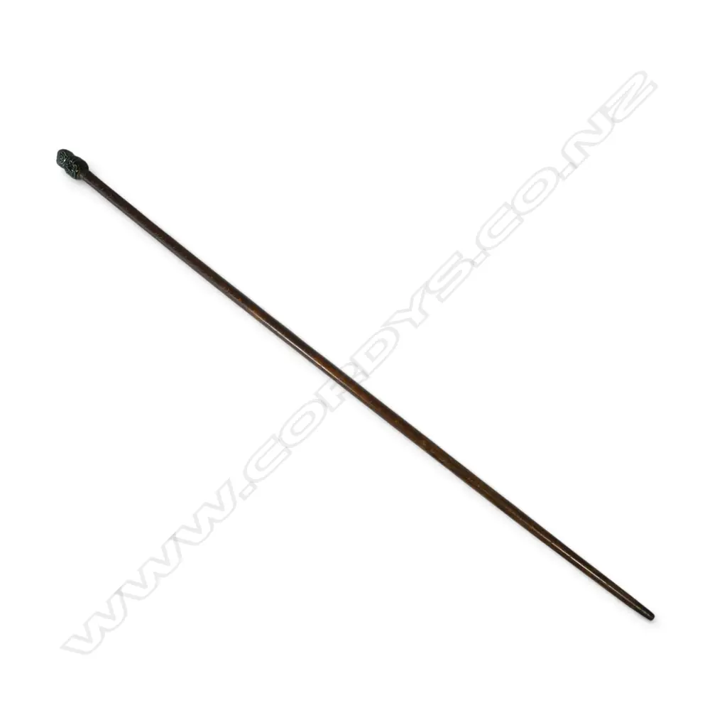 A vintage ceramic tiki form handled walking stick Image 1++