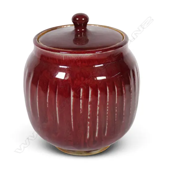 Peter Alger red lidded jar,