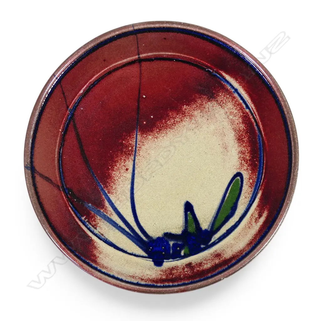 Warren Tippett red glazed plate, Image 1++