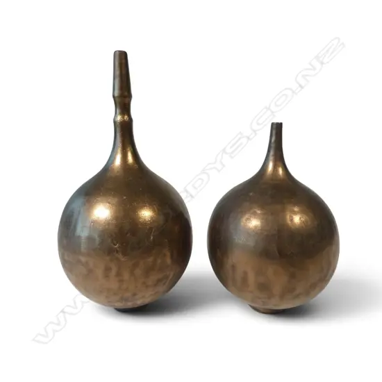 John Parker two metallic lustre spire vases, copper/manganese glazed.