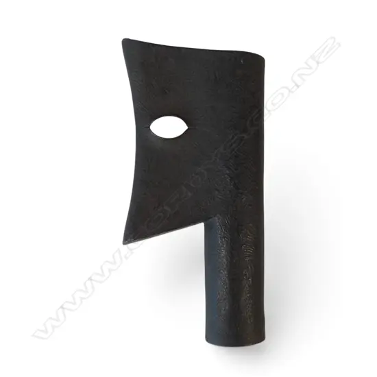 20thC  Japanese iron(?) wall vase in form of an axe head with human features,