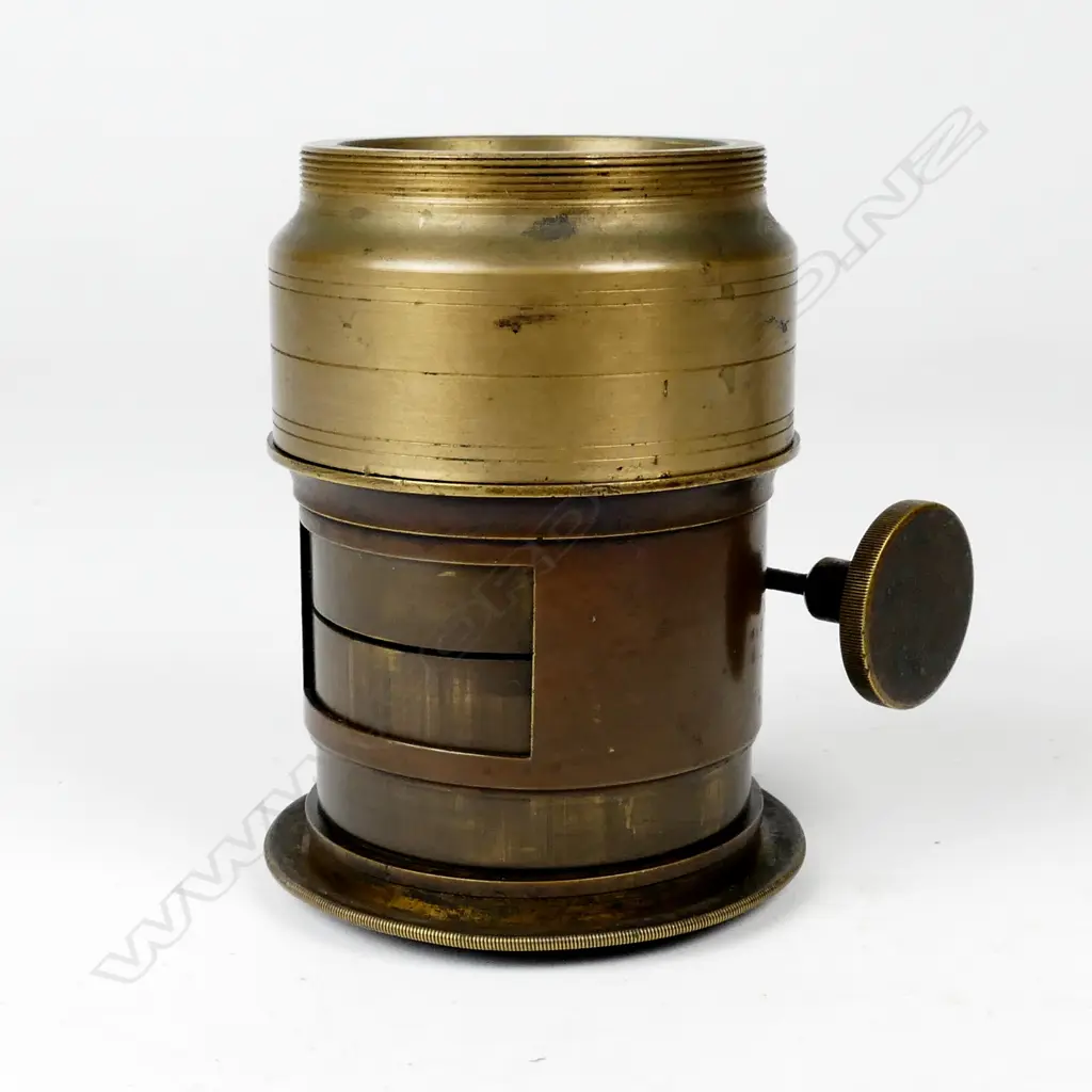 A vintage brass lens Image 1++