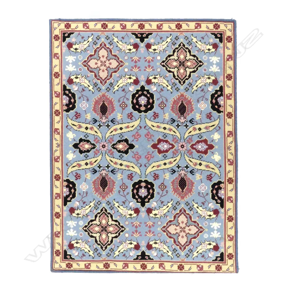 A hand embroidered panel depicting a Persian rug design Image 1++