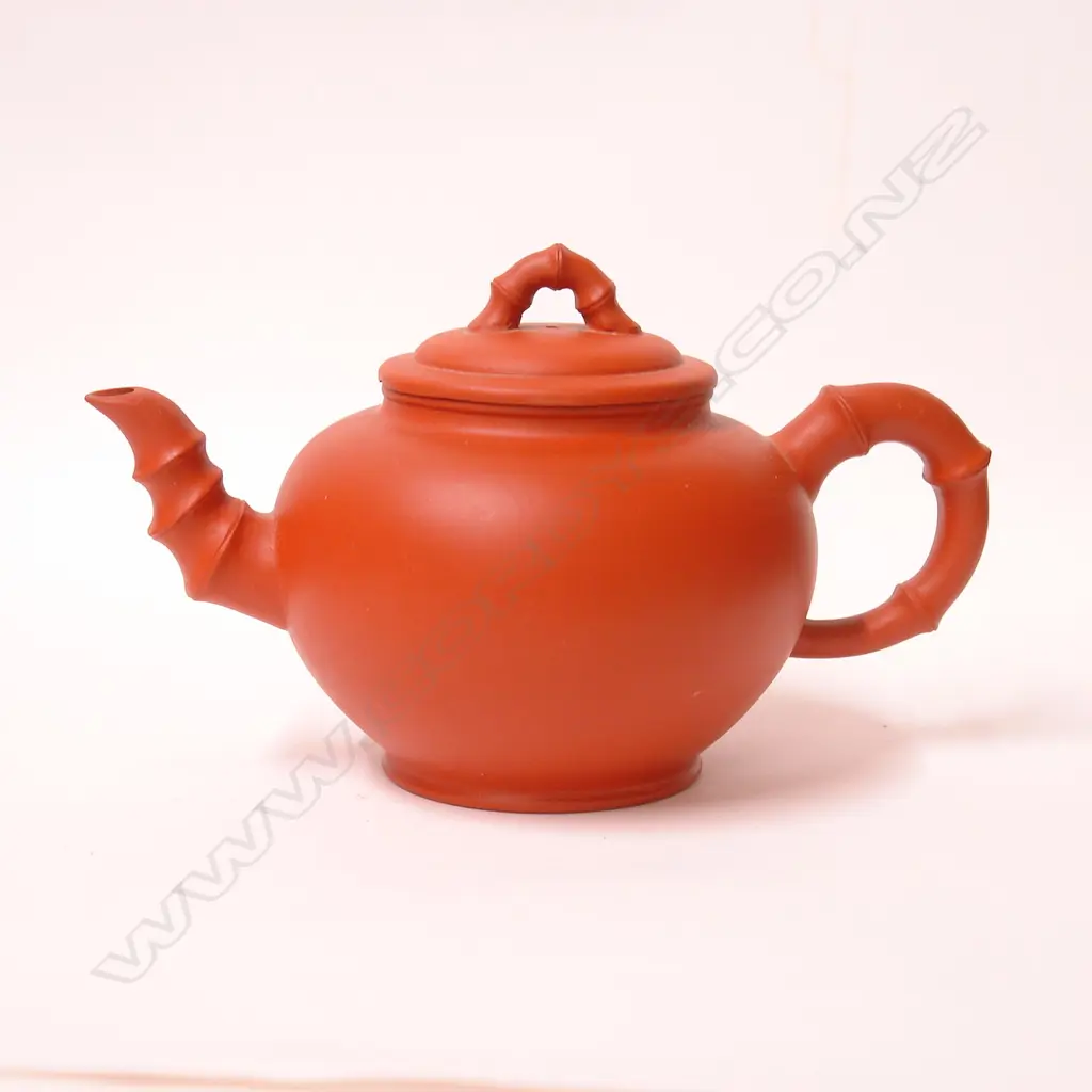 A Chinese Yixing plain spherical form teapot Image 1++