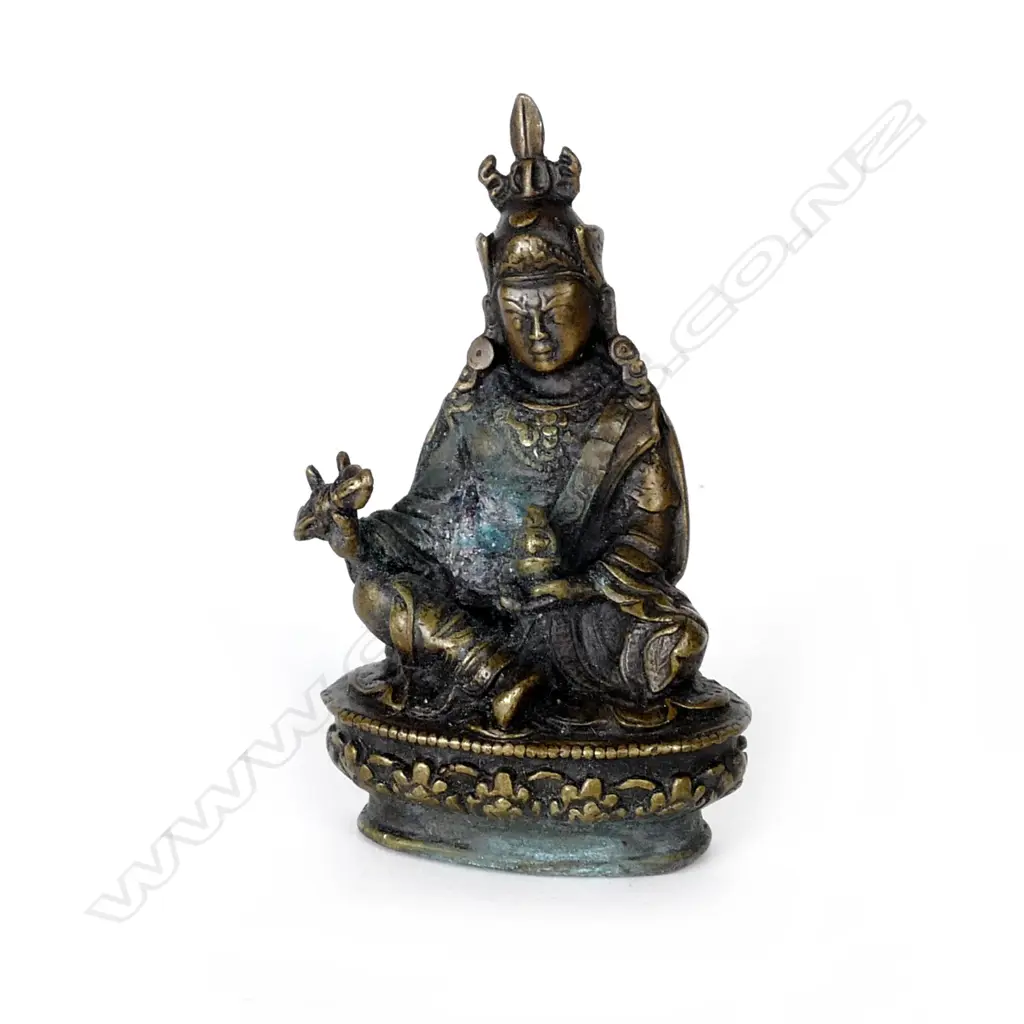 A small Chinese bronze figure of a seated Buddha Image 1++