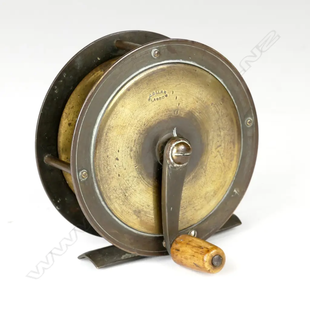 A late 19thC brass 3½" x 1¼" plate fishing reel Image 1++