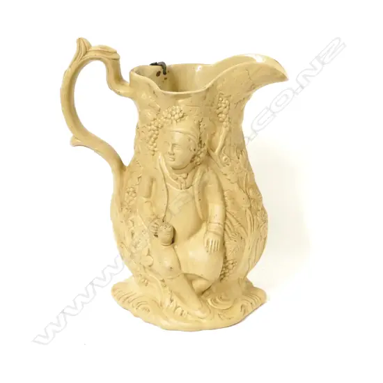A Victorian English earthenware ale jug