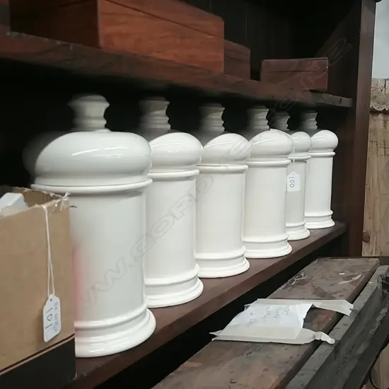 SIX CREAM PORCELAIN CANNISTERS / JARS