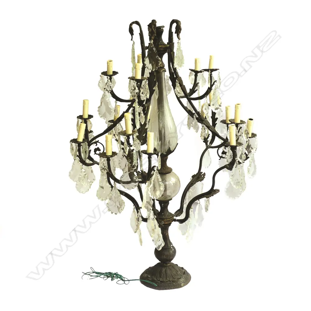 An impressive wrought iron and crystal floor standing chandelier Image 1++