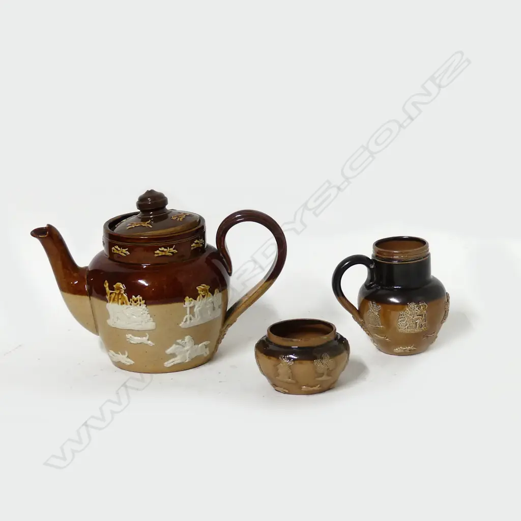 A Doulton three piece miniature tea set Image 1++