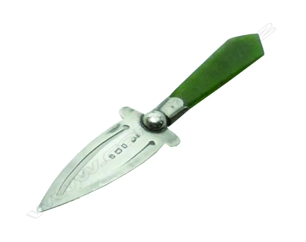 A silver and greenstone page marker Image 1++