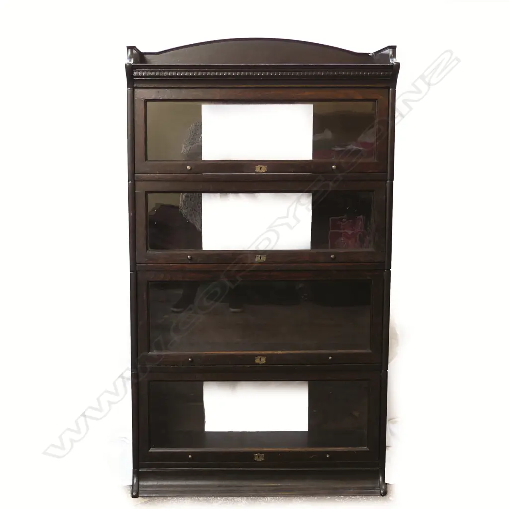 A four-section oak library bookcase Image 1++