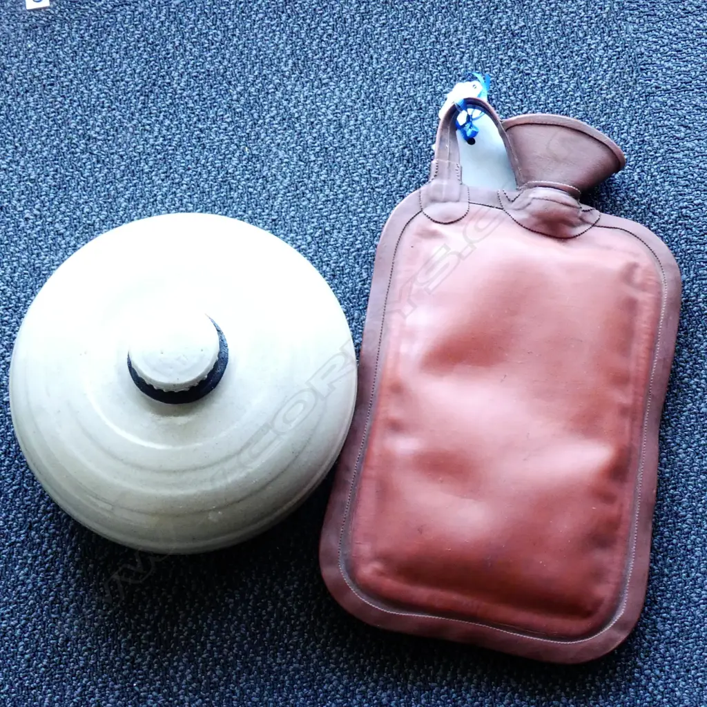 BED-WARMER BY TEMUKA POTTERY, AND A 1940s RUBBER HOT WATER BOTTLE Image 1++