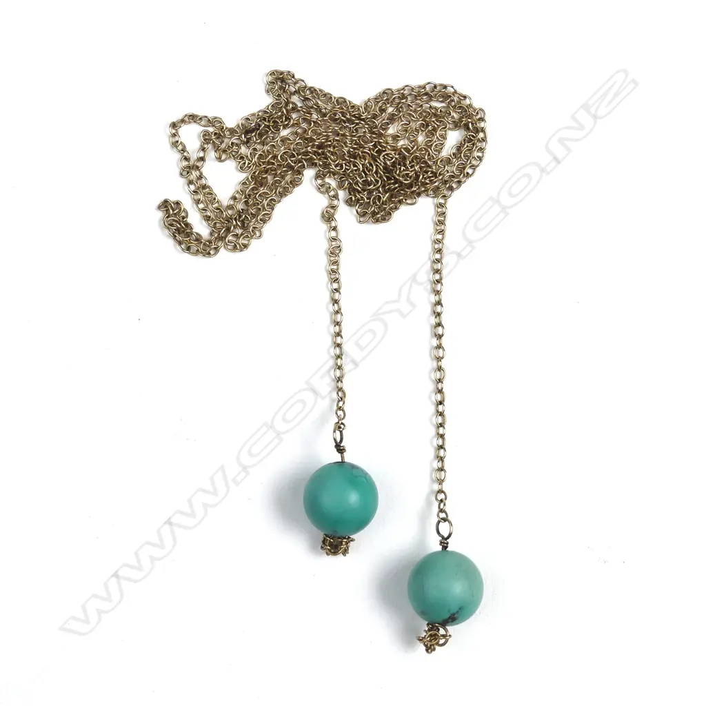 A small 9ct gold and bead sautoir Image 1++