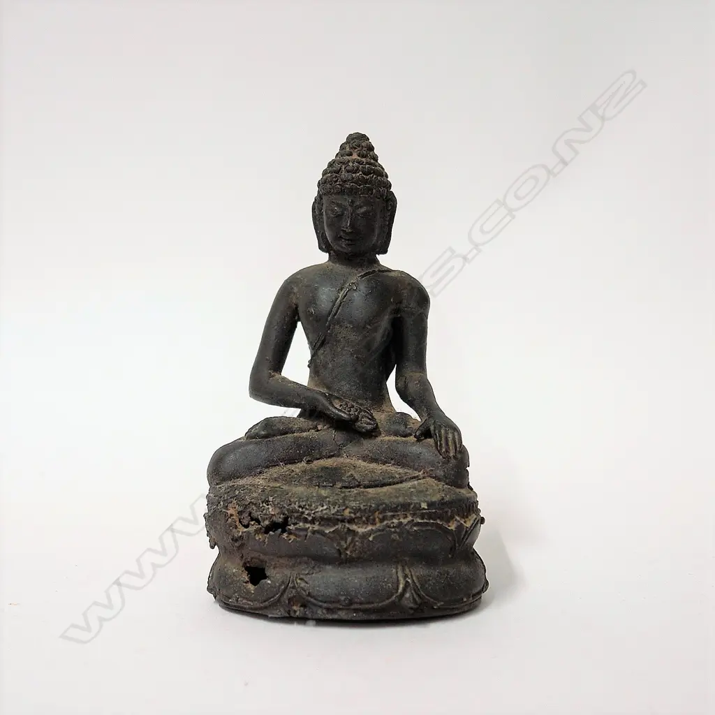 An old Indonesian bronze seated Buddha Image 1++