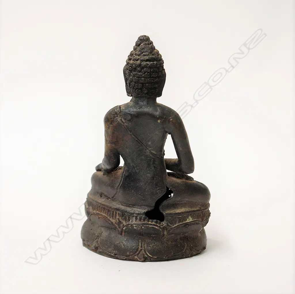 An old Indonesian bronze seated Buddha Image 1++
