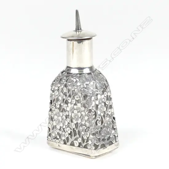 A c.1890 Chinese silver Wang Hing covered glass perfume bottle