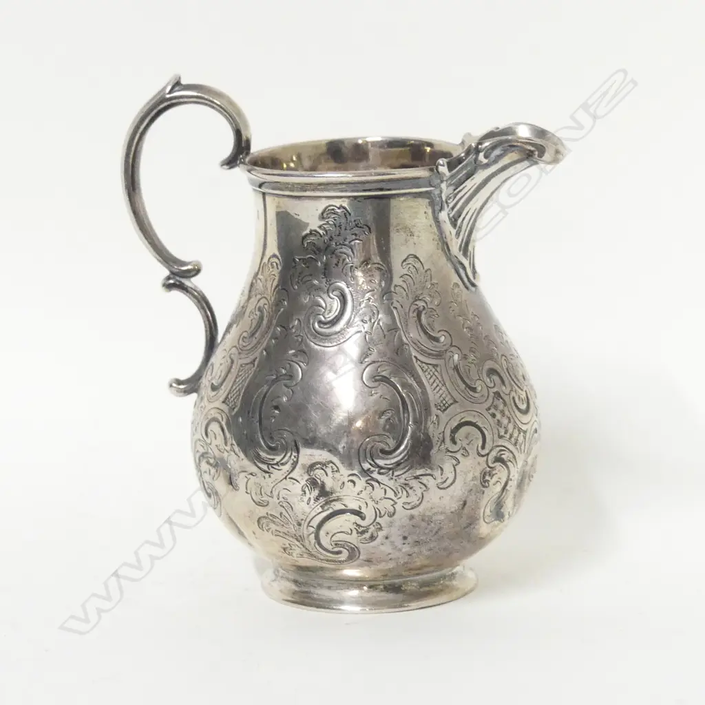 A Victorian silver cream jug Image 1++