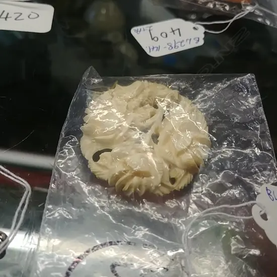 BONE BROOCH AND PAIR OF EARRINGS