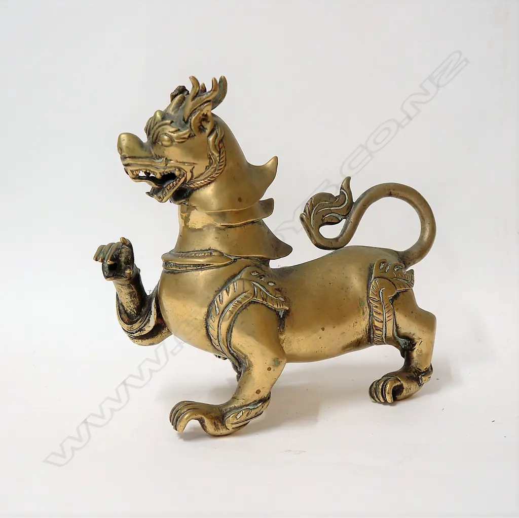 An old Chinese cast brass mythical beast Image 1++