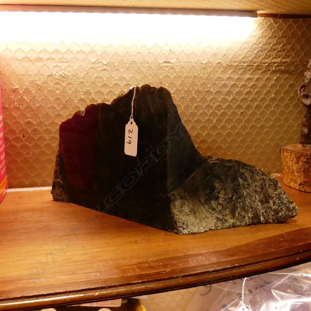 A natural and polished piece of pounamu Image 1++