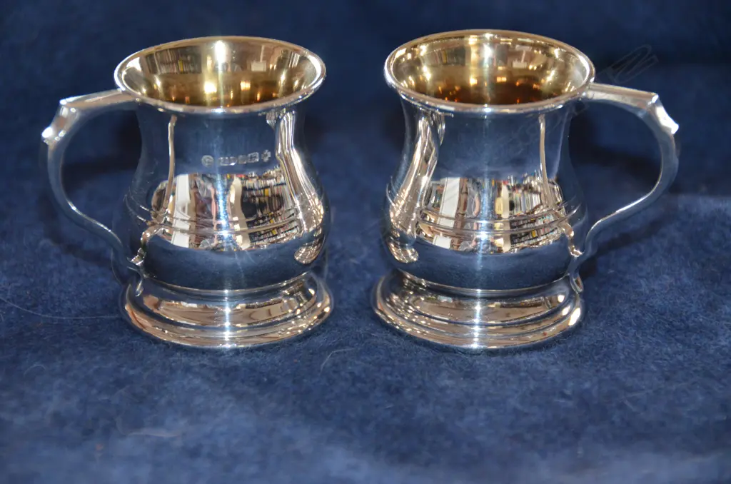 PAIR OF MINI SILVER TANKARDS 2000 Image 1++