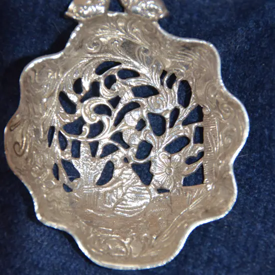 SILVER TEA STRAINER & SERVIETTE RING